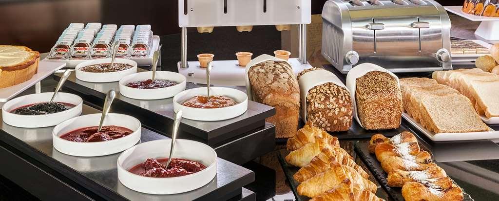 فندق إن إتش تيميسوارا تيميشورا المطعم الصورة
